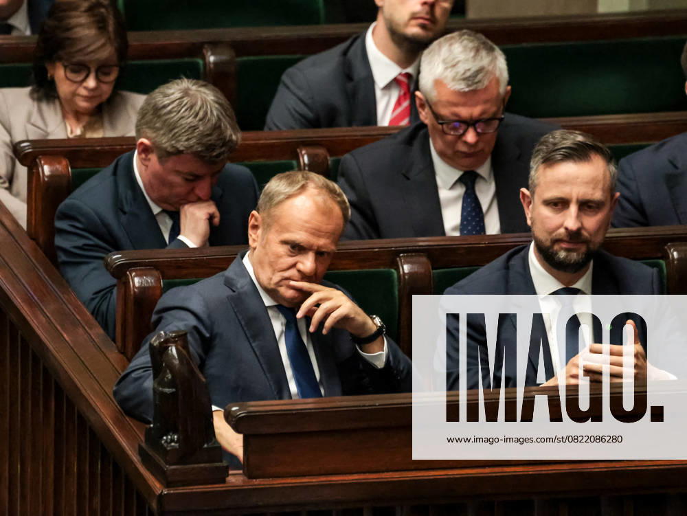 Vote Of Confidence Of Polish Government Prime Minister of Poland Donald Tusk, Deputy Prime Minister and Minister of Defence Wladyslaw Kosiniak Kamysz listen to comments during the plenary proceedings of vote of confidence for Polish government Polish Parliament building after the coalition which holds power lost presidential election - Warsaw, capital of Poland on June 11, 2025. Warsaw mazowieckie Poland