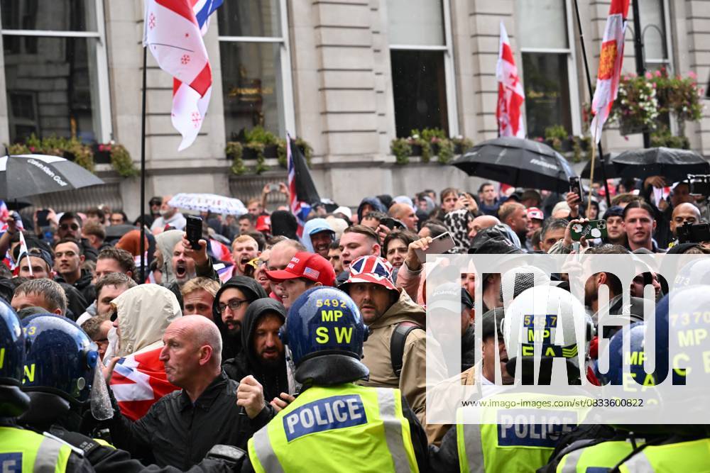 Clashes erupt between police and protesters at anti-immigration march in London organized by Tommy Robinson LONDON, UNITED KINGDOM - SEPTEMBER 13: Clashes erupt between police and protesters as thousands of people march through central London in a rally called Unite the Kingdom, organized by far-right activist Tommy Robinson to protest government immigration policies, on September 13, 2025. Police intervened when Robinson supporters attempted to approach the area where March Against Fascism demonstrators had gathered. Several protesters were detained during the scuffles. Rasid Necati Aslim Anadolu London United Kingdom. Editorial use only. Please get in touch for any other usage.
