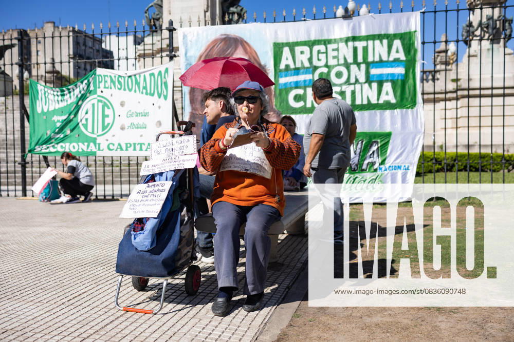 An elderly woman stands before the National Congress, defying President Javier Mileiâ€⠢s austerity measures. Buenos Aires Argentina - ZUMAp265 20251001_zip_p265_001
