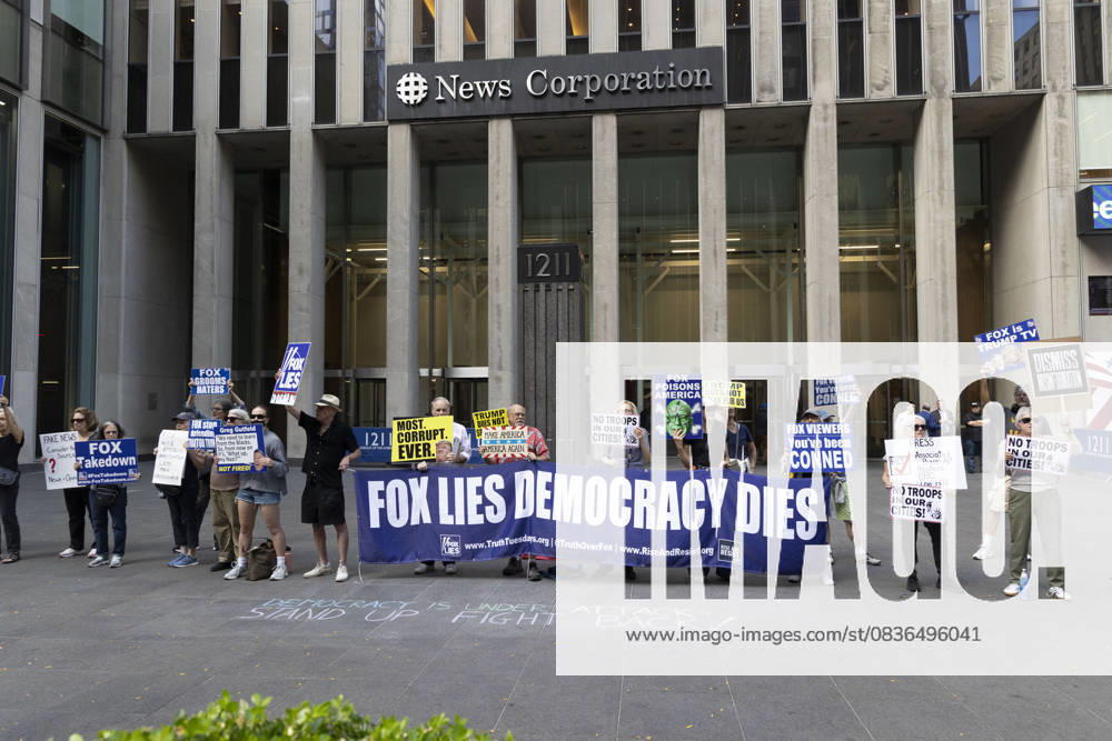 Demonstrators denouncing Fox News as extremist right-wing propaganda in support of President Trump s administration hold a banner and signs that read FOX LIES DEMOCRACY DIES outside of News Corp s Fox News Channel in midtown Manhattan. Protesters with the activist groups Rise & Resist and Truth Tuesdays come to Fox News weekly calling for truth in journalism and denouncing authoritarianism, oligarchy, fascism, and Trump s agenda. New York USA - ZUMAr174 20251007_znp_r174_027