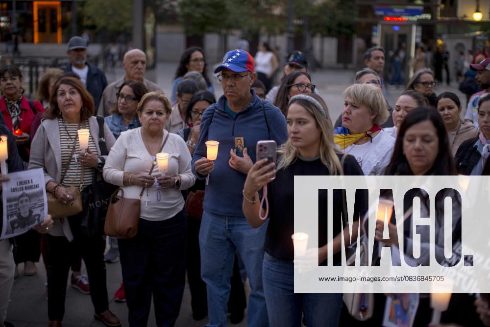 Members of the Venezuelan community in Madrid holding candles and Venezuelan flags in Opera Square in downtown Madrid, during a vigil to pray the rosary for the beatification of Venezuelans Jose Gregorio Hernandez and Carmen Rendiles on October 19, 2027, in St. Peter s Square, Rome. Madrid Spain - ZUMAs296 20251011_znp_s296_004