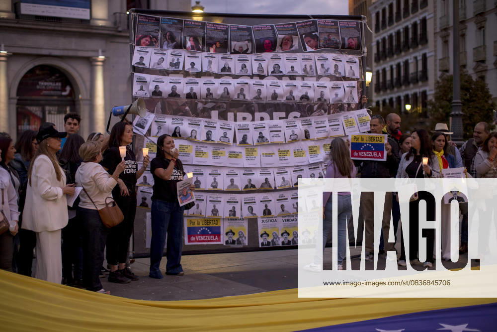 Members of the Venezuelan community in Madrid holding candles and Venezuelan flags in Opera Square in downtown Madrid, during a vigil to pray the rosary for the beatification of Venezuelans Jose Gregorio Hernandez and Carmen Rendiles on October 19, 2027, in St. Peter s Square, Rome. Madrid Spain - ZUMAs296 20251011_znp_s296_005