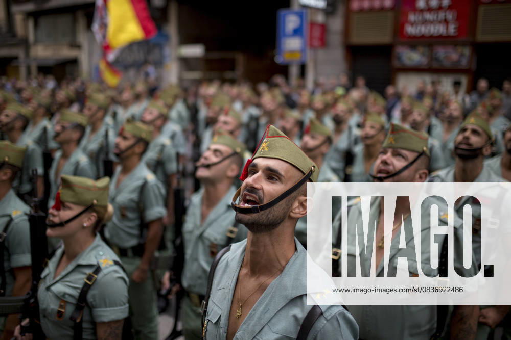 Members of La Legion, the elite forces of the Spanish army, sing the song â€oeEl Novio de La Muerteâ€Â, the anthem of the elite group during a military parade through the streets of Madrid on Spain s National Day, which commemorates the arrival of Christopher Columbus to the New World in 1492. Madrid Spain - ZUMAs296 20251012_znp_s296_016