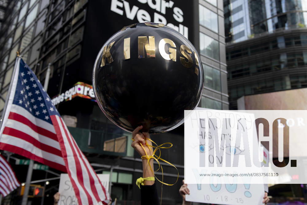 Protesters march down Broadway during the â€oeNo Kings†rally in New York, Saturday, Oct. 18, 2025. The demonstration began in Times Square and ended in Union Square, drawing an estimated 50,000 people who joined others across the country calling for the protection of democratic institutions and denouncing authoritarian leadership. Organizers said more than 5 million people participated in over 2,000 marches nationwide. New York USA - ZUMAa306 20251018_znp_a306_012