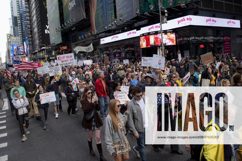 Protesters march down Broadway during the â€oeNo Kings†rally in New York, Saturday, Oct. 18, 2025. The demonstration began in Times Square and ended in Union Square, drawing an estimated 50,000 people who joined others across the country calling for the protection of democratic institutions and denouncing authoritarian leadership. Organizers said more than 5 million people participated in over 2,000 marches nationwide. New York USA - ZUMAa306 20251018_znp_a306_011