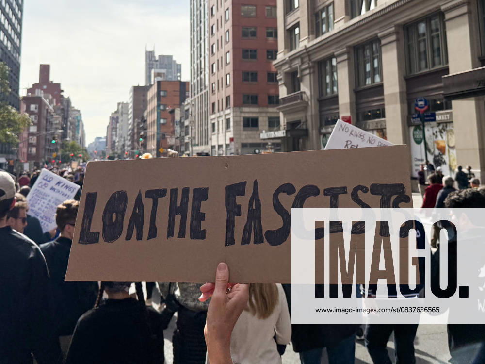 Protesters march in the No Kings Protest against the Trump administration down Seventh Avenue in Chelsea on October 18, 2025 in New York. New York USA - ZUMAb148 20251018_zap_b148_003