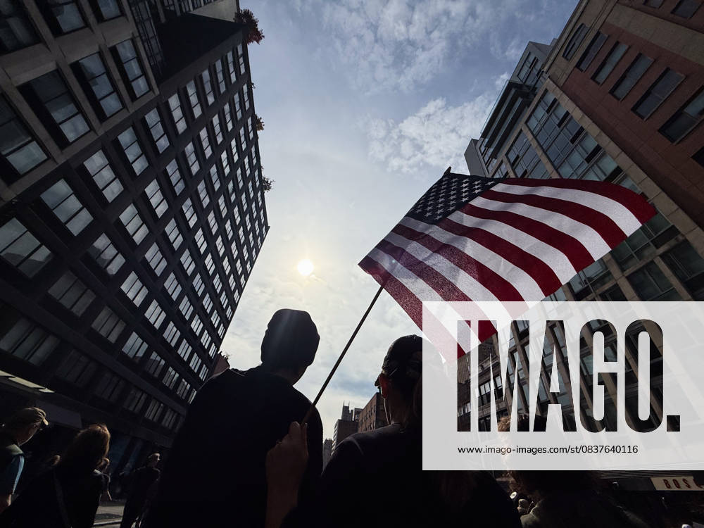Protesters march in the No Kings Protest against the Trump administration down Seventh Avenue in Chelsea. New York USA - ZUMAb148 20251018_zap_b148_001