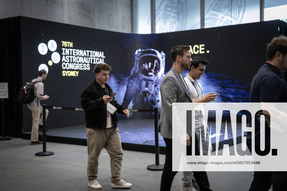 76th International Astronautical Congress in Sydney SYDNEY, AUSTRALIA - OCTOBER 2: People explore exhibitions in the foyer area and take part in space-themed interactive experiences during the Public Day event of the 76th International Astronautical Congress (IAC 2025) in Sydney, Australia on October 2, 2025. The congress concluded with a flag handover ceremony to Turkiye, which will host the 77th edition of the event next year. Organized under the theme Sustainable Space: Resilient Earth from September 29 to October 3, the congress brought together thousands of participants from the global space community. Ozge Elif Kizil Anadolu Sydney Australia. Editorial use only. Please get in touch for any other usage.