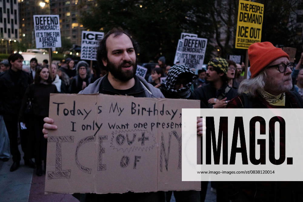 A protester holds a sign saying â€oeTodayâ€⠢s My Birthday, I only want one present: ICE out of NYC†during a demonstration at Foley Square, in New York, on Wednesday, Oct. 22, 2025. This response comes after more than 50 federal agents arrested immigrant vendors at Canal Street, lower Manhattan, on Tuesday. New York USA - ZUMAs368 20251022_zip_s368_012