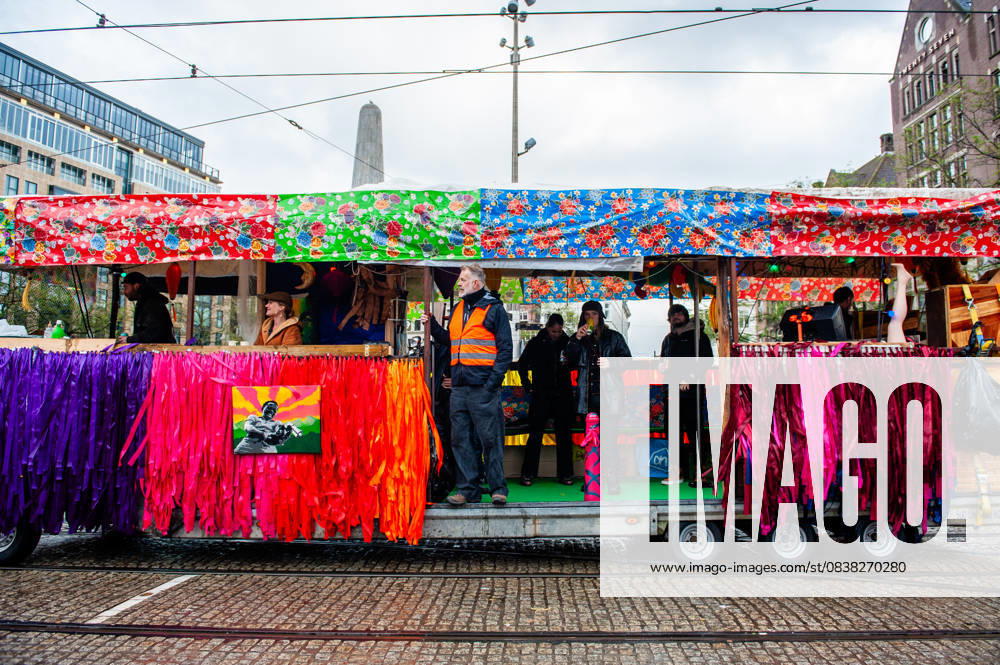 A colorful truck is arriving at the starting point. ADEV (Amsterdam Danst Ergens Voor), in English Amsterdam Dances For A Cause , organized for the 13th time its annual demonstration for squatting, free spaces, and affordable housing in the city. People danced, accompanied by large trucks and loud music systems, to reclaim more free spaces in the city. Amsterdam Netherlands - ZUMAs197 20251025_aaa_s197_457