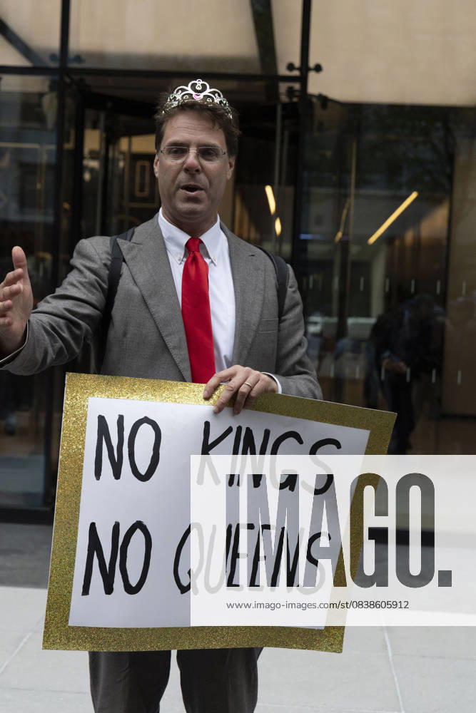 A demonstrator wearing a crown dresses up as King President Trump and holds a sign that reads NO KINGS NO QUEENS at a rally and picket against the Governor s recent climate policy announcement outside Hochul s New York City office in Midtown Manhattan. Climate activists say President Trump isn t a king and Governor Hochul isn t a Queen after she announced plans to delay the implementation of a state law set to begin January 1st that ends gas use in new construction. Demonstrators also denounce what they call the Governor s lurch to Trumpism for fast tracking the permitting for a fracked gas pipeline. The peaceful protest is organized by New York Communities For Change, Food and Water Watch NY - ZUMAr174 20251028_znp_r174_015