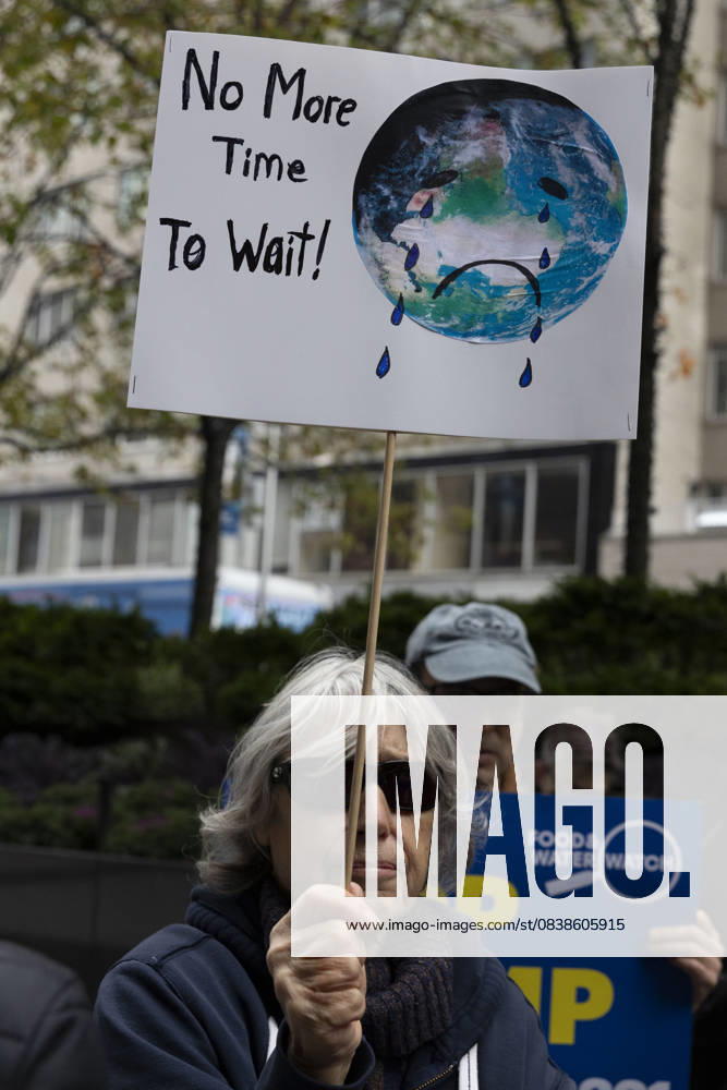 A demonstrator holds a sign that reads No More Time To Wait! with an image of the Earth weeping at a rally and picket against the Governor s recent climate policy announcement outside Hochul s New York City office in Midtown Manhattan. Climate activists say President Trump isn t a king and Governor Hochul isn t a Queen after she announced plans to delay the implementation of a state law set to begin January 1st that ends gas use in new construction. Demonstrators also denounce what they call the Governor s lurch to Trumpism for fast tracking the permitting for a fracked gas pipeline. The peaceful protest is organized by New York Communities For Change, Food and Water Watch NY and NYPIRG. New - ZUMAr174 20251028_znp_r174_018