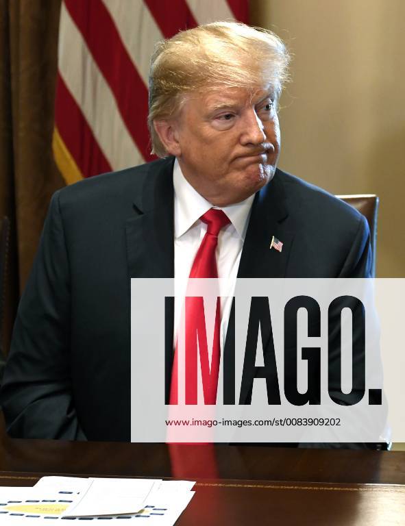 President Donald Trump listens to remarks during a meeting with members of Congress, at the White House, June 20, 2018, in Washington, DC. Trump made remarks on immigration regarding the forced separation of children from families at the Mexican border. WAP20180620505 MIKExTHEILER
