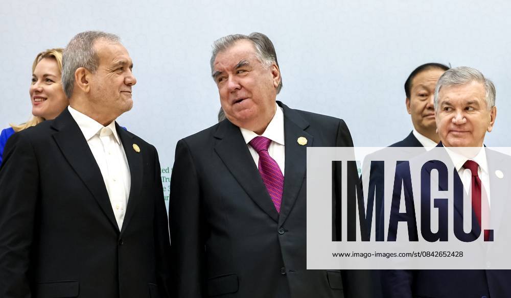 Turkmenistan Russia 9069949 12.12.2025 Iranian President Masoud Pezeshkian, Tajik President Emomali Rahmon and Uzbek President Shavkat Mirziyoyev attend a family photo opportunity before a plenary session of the International Forum dedicated to the International Year of Peace and Trust, the International Day of Neutrality, and the 30th anniversary of Turkmenistan s neutrality status, at the Congress Centre in Ashgabat, Turkmenistan. Alexander Kazakov Sputnik Ashgabat Turkmenistan