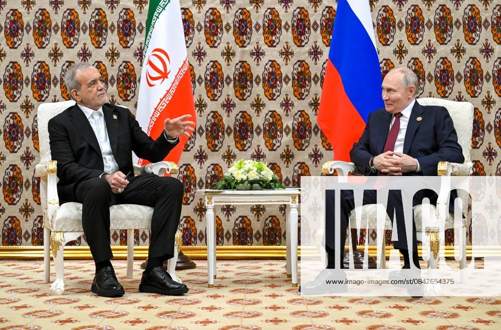 Turkmenistan Russia 9069958 12.12.2025 Iranian President Masoud Pezeshkian and Russian President Vladimir Putin attend a meeting in Ashgabat, Turkmenistan. Kristina Kormilitsyna Sputnik Ashgabat Turkmenistan