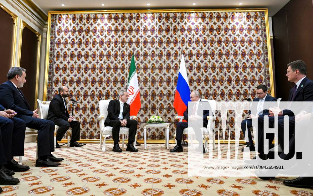 Turkmenistan Russia 9069966 12.12.2025 Iranian President Masoud Pezeshkian and Russian President Vladimir Putin attend a meeting in Ashgabat, Turkmenistan. Kristina Kormilitsyna Sputnik Ashgabat Turkmenistan