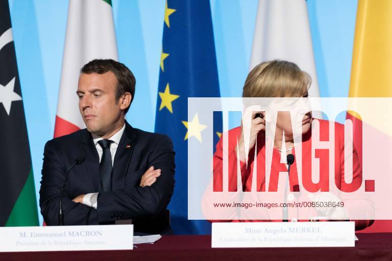 French President Emmanuel Macron, and German Chancellor Angela Merkel, attend a joint press conference on August 28, 2017 at the presidential Elysee palace in Paris.