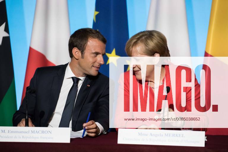 French President Emmanuel Macron, and German Chancellor Angela Merkel, attend a joint press conference on August 28, 2017 at the presidential Elysee palace in Paris.
