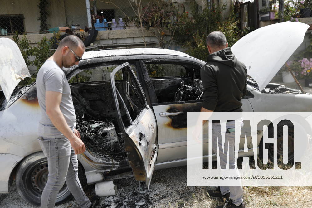 Palestinians inspect damage after settler attack near Hebron Palestinians inspect damage at the site of an attack carried out by Israeli settlers targeting Palestinian vehicles and property in the town of Surif northwest of Hebron in the occupied West Bank on May 17, 2026. Settlers set fire to a vehicle and spray-painted racist slogans at the scene, amid anger and condemnation among Palestinian residents over repeated attacks on their property. Photo by Mamoun Wazwaz apaimages Hebron West Bank Palestinian Territory 170526_Hebron_MW_00(13)