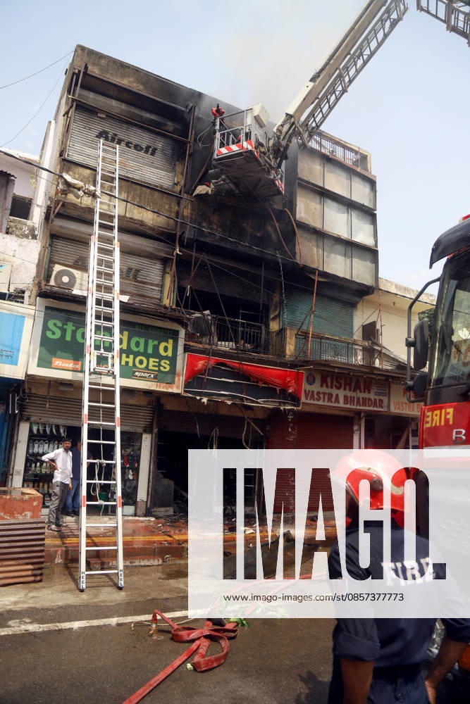 Firefighting operations underway after fire breaks out at a commercial building in Kingsway Camp near GTB Nagar metro station New Delhi, May 23 (ANI): Firefighting operations underway after fire breaks out at a commercial building in Kingsway Camp near GTB Nagar metro station, in New Delhi on Saturday. New Delhi Delhi India