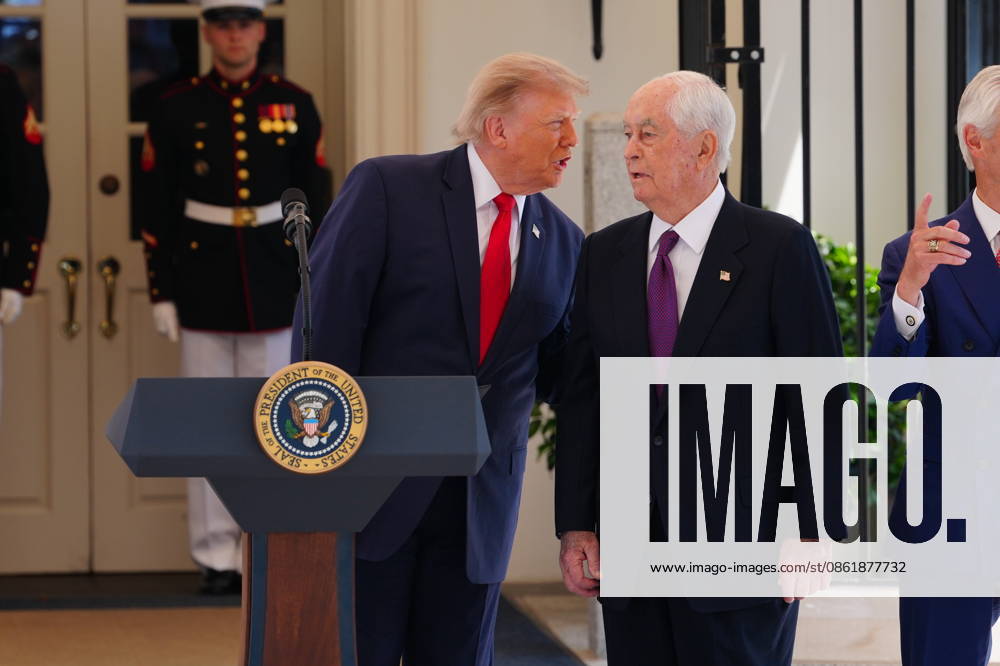 United States President Donald J Trump speaks to IndyCar series owner Roger Penske as he hosts top IndyCar drivers at the White House in Washington, DC, USA, to promote the inaugural Freedom 250 Grand Prix on Monday, July 13, 2026. The race will be held in DC on August 22-23, 2026. Credit: CNP AdMedia Washington District of Columbia United States of America