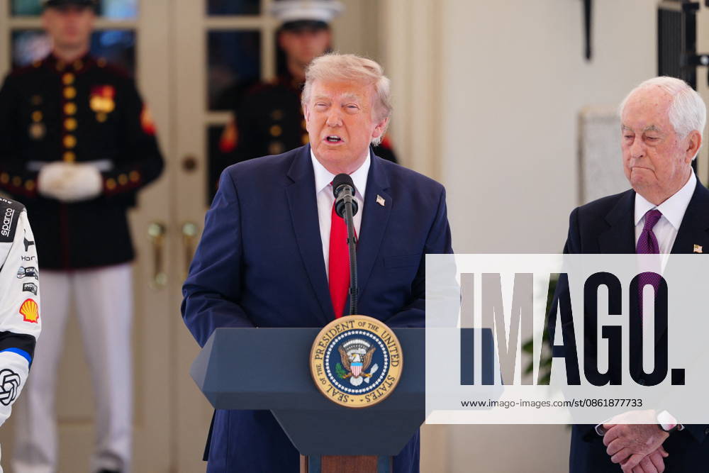 United States President Donald J Trump makes remarks as he hosts top IndyCar drivers at the White House in Washington, DC, USA, to promote the inaugural Freedom 250 Grand Prix on Monday, July 13, 2026. The race will be held in DC on August 22-23, 2026. Looking on from right is IndyCar series owner Roger Penske. Credit: CNP AdMedia Washington District of Columbia United States of America