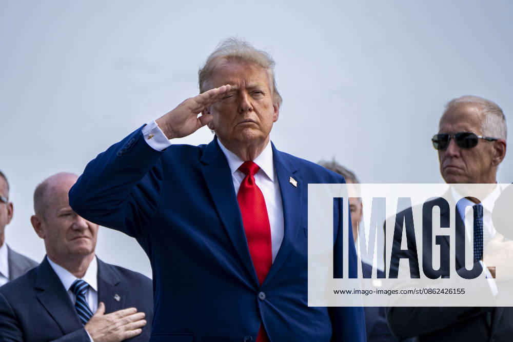 President Donald Trump salutes during the dignified transfer of Army 1st Lt. Tyler James Feehan, Army Staff Sgt. Emmanuel Swinton, Army Sgt. Angel Rampersad and Army Pvt. Isabella Gonzales at Dover Air Force Base in Dover, Delaware on Wednesday, July 22, 2026. WAP20260722355 BONNIExCASH
