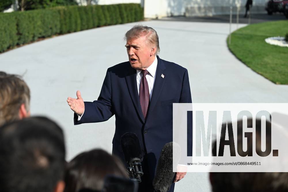 U.S. President Donald Trump talks to the media before boarding Marine One on the South Lawn of the White House in Washington, DC, United States, on October 2, 2026. Washington USA - ZUMAs197 20261002_aaa_s197_268