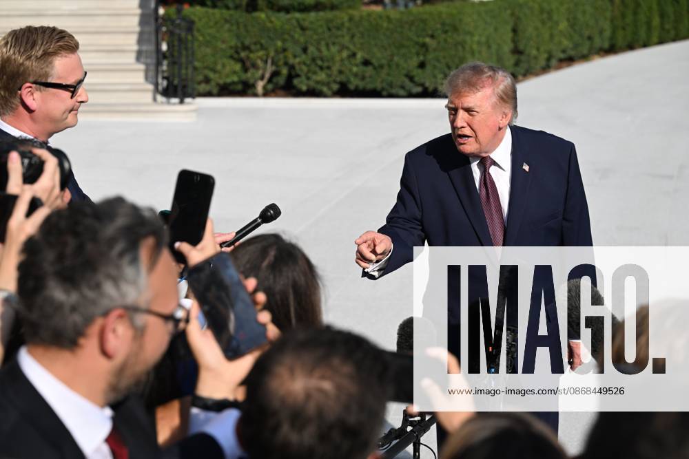 U.S. President Donald Trump talks to the media before boarding Marine One on the South Lawn of the White House in Washington, DC, United States, on October 2, 2026. Washington USA - ZUMAs197 20261002_aaa_s197_262