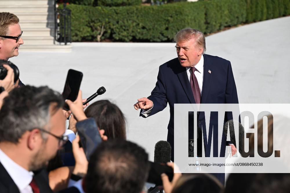 U.S. President Donald Trump talks to the media before boarding Marine One on the South Lawn of the White House in Washington, DC, United States, on October 2, 2026. Washington USA - ZUMAs197 20261002_aaa_s197_260