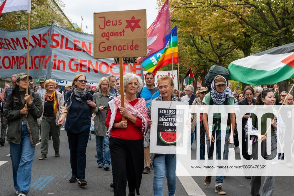 BERLIN, GERMANY †OCTOBER 3, 2026: Thousands of people took part in a peace demonstration in central Berlin on German Unity Day. A coalition of peace initiatives, trade unions, and political and civil-society groups organized the protest. The demonstrators focused on military rearmament, the possible reintroduction of conscription, and Germanyâ€⠢s military policy. The march began at the Brandenburg Gate and continued through the government district before concluding with a rally. The demonstration brought together participants expressing opposition to Germanyâ€⠢s current and proposed military policies on a national public holiday. Berlin Germany - ZUMAq101 20261003_zna_q101_088