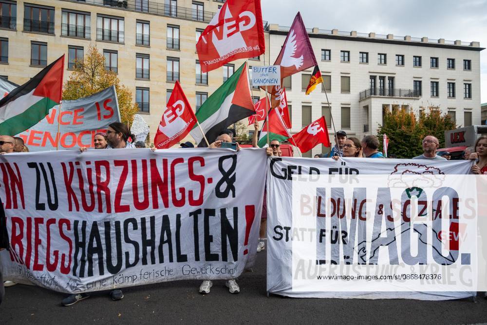 BERLIN, GERMANY †OCTOBER 3, 2026: Thousands of people took part in a peace demonstration in central Berlin on German Unity Day. A coalition of peace initiatives, trade unions, and political and civil-society groups organized the protest. The demonstrators focused on military rearmament, the possible reintroduction of conscription, and Germanyâ€⠢s military policy. The march began at the Brandenburg Gate and continued through the government district before concluding with a rally. The demonstration brought together participants expressing opposition to Germanyâ€⠢s current and proposed military policies on a national public holiday. Berlin Germany - ZUMAq101 20261003_zna_q101_093