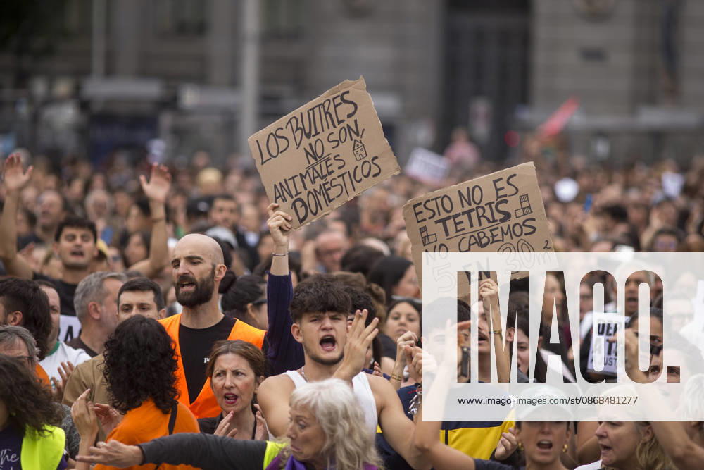 Protesters hold placards and shout during a demonstration through the streets of Madrid demanding a reduction in housing rents. The demonstration was organized by the Tenants Union, which also organized the encampment in Puerta del Sol square in central Madrid. Madrid Spain - ZUMAs197 20261003_aaa_s197_110