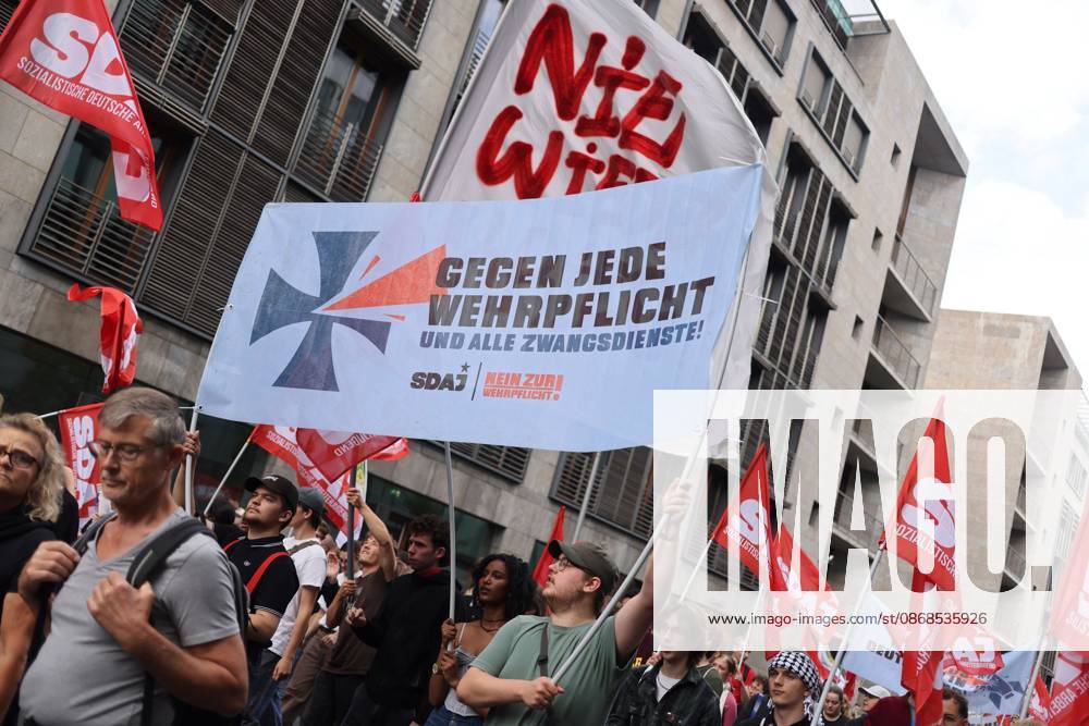 BERLIN, GERMANY, OCTOBER 3, 2026: Thousands of demonstrators march through central Berlin during a protest against Germany s military buildup, increased defense spending and the possible reintroduction of compulsory military service. Protesters called for greater investment in healthcare, housing, education and other social services instead of military spending, while participants also demonstrated against German arms deliveries and support for Israel amid the war in Gaza. The march began at the Brandenburg Gate and continued through central Berlin before returning to the area. Berlin Germany - ZUMAq101 20261003_zna_q101_220