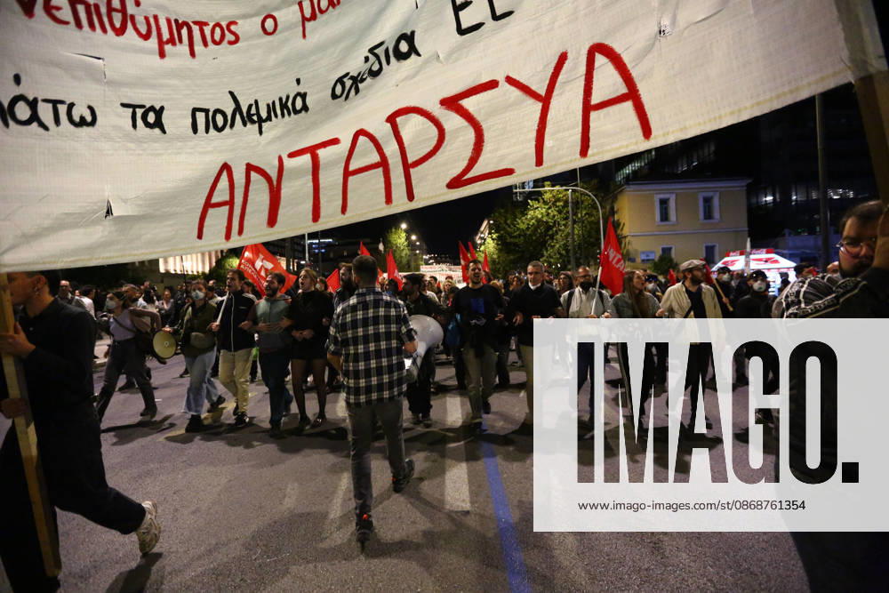 Demonstrators march beneath a banner during an anti-war protest opposing the visit of US Secretary of State MARCO RUBIO. Athens GREECE - ZUMAx103 20261006_zip_x103_026