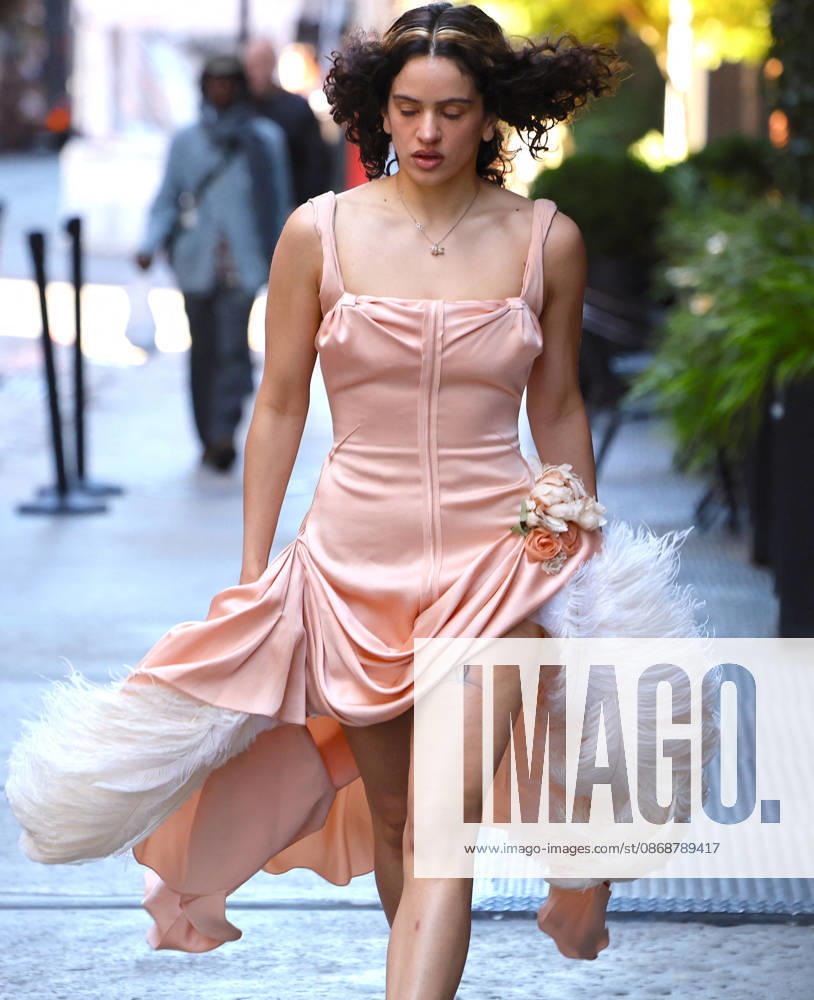Rosalia Leaves Her Hotel - NYC Spanish Singer Rosalia with a nice pink dress leaves her hotel in New York on October 6, 2026. Photp by Dylan Travis ABACAPRESS.COM New York City NY United States