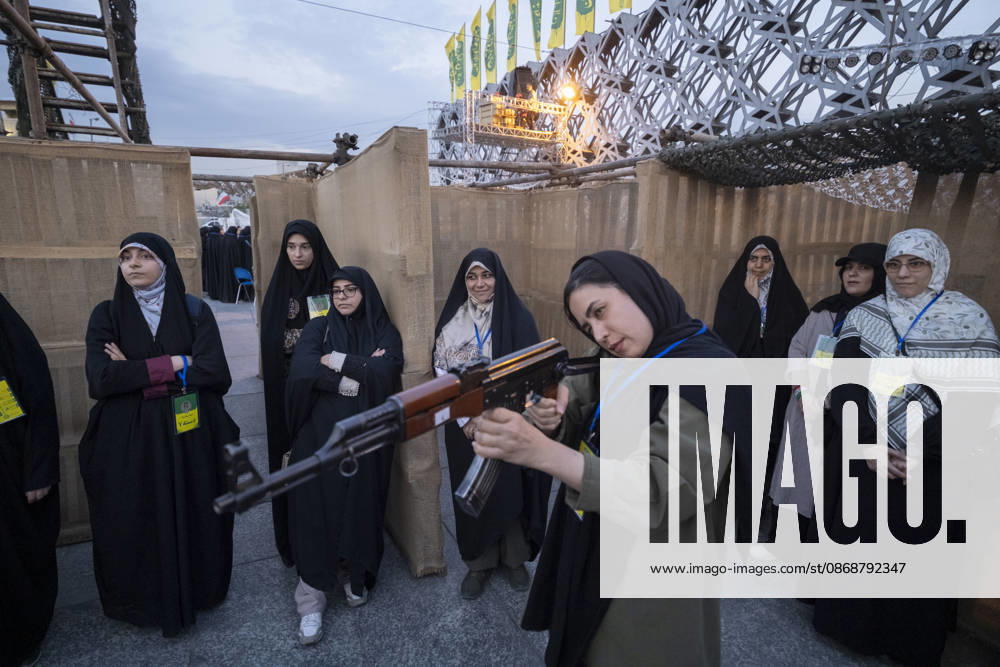 Urban Warfare Training For Iran s Female Self-sacrificing Forces A member of Iran s female self-sacrificing forces holds an AK-47 rifle during urban warfare training at a military camp in a city square in southern Tehran, Iran, on October 6, 2026, amid rising tensions between Iran and the United States. Tehran Tehran Iran