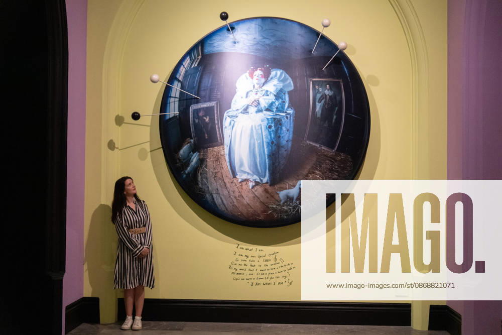 Tim Walker s Fairyland: Love and Legends Photo Call at National Portrait Gallery, London, UK - 7 October 2026 A staff member views Liz Carr as Elizabeth I by Tim Walker as part of The National Portrait Gallery s Tim Walker s Fairyland: Love and Legends Exhibition which runs from 9th October 2026 - 7th February 2027 at National Portrait Gallery in London, England, UK on Wednesday 7 October, 2026., Credit:Justin Ng Avalon UK, England, London, National Portrait Gallery
