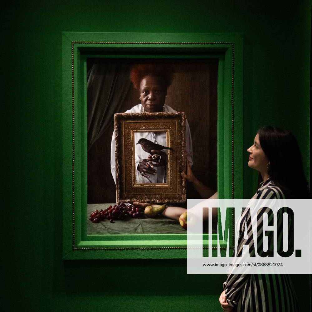Tim Walker s Fairyland: Love and Legends Photo Call at National Portrait Gallery, London, UK - 7 October 2026 A staff member views Olivette Cole-Wilson, and blackbird by Tim Walker as part of The National Portrait Gallery s Tim Walker s Fairyland: Love and Legends Exhibition which runs from 9th October 2026 - 7th February 2027 at National Portrait Gallery in London, England, UK on Wednesday 7 October, 2026., Credit:Justin Ng Avalon UK, England, London, National Portrait Gallery