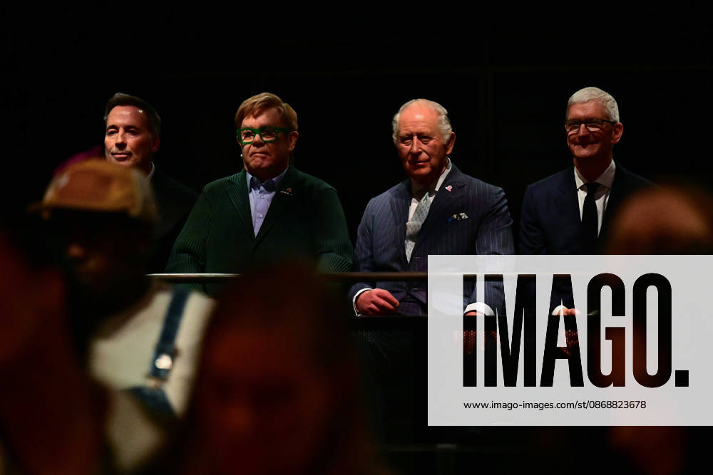 Britain s King Charles III listens along side British singer-songwriter Elton John (2L), his husband David Furnish (L) and Apple Ceo Tim cook (R) during a soundcheck during a music workshop for young people, the first as part of the Apple x Kings Trust Creative Labs, at Battersea Power Station in south west London on October 7, 2026., Credit:BEN STANSALL PA ROTA - B68 Avalon United Kingdom, London