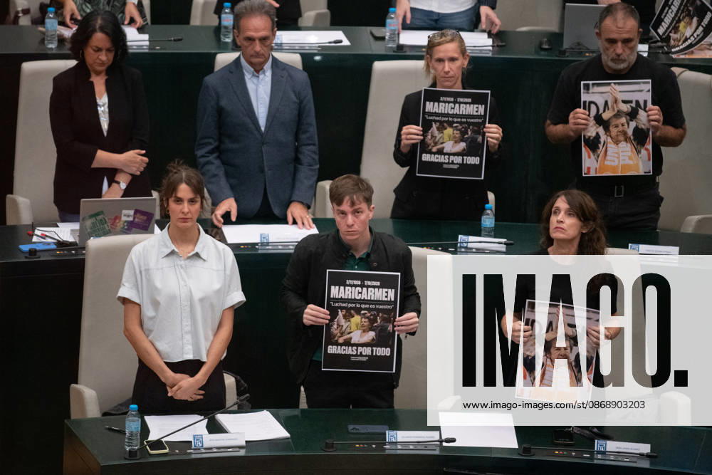 The Madrid City Council holds a special plenary session to approve two plans to increase housing. The spokesperson for Más Madrid on the City Council, Rita Maestre i, and the Más Madrid council members hold up a poster of Maricarmen during a special plenary session at the Palacio de Cibeles on October 8, 2026, in Madrid, Spain. The Madrid City Council is holding a special plenary session to give the green light to two special plans initially approved by the Governing Board, one of which will allow for the establishment of any type of lodging—including aparthotels, flex living, guesthouses, or lodging facilities on more than 240 industrial-use lots spread across eight districts of the capital, and one that amends municipal regulations to al