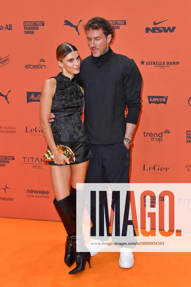 Romina Palm und Christian Wolf bei der ABOUT YOU Opera Modenschau in Berlin am 07.10.2026