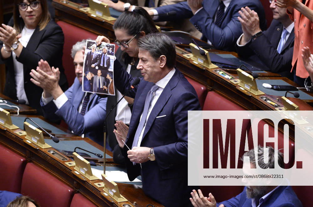IPA89426081 - Rome, Chamber of Deputies: Electoral Law, explanations of vote, and final vote; in the photo, Giuseppe Conte holds up a picture showing Scarpinato with Falcone and Borsellino