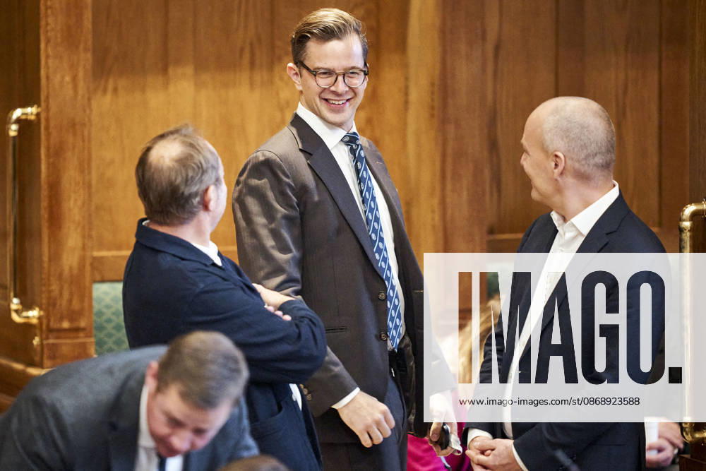 Opening debate in the Danish Parliament Minister of Business and Competitiveness Martin Lidegaard, The Social Liberal Party, chairman of the Liberal Alliance Alex Vanopslagh, and political leader of the Red-Green Alliance Pelle Dragsted (seen from left to right) i chatting during the parliamentary opening debate in the Folketing Hall at Christiansborg on Thursday, October 8, 2026. , Copenhagen Denmark