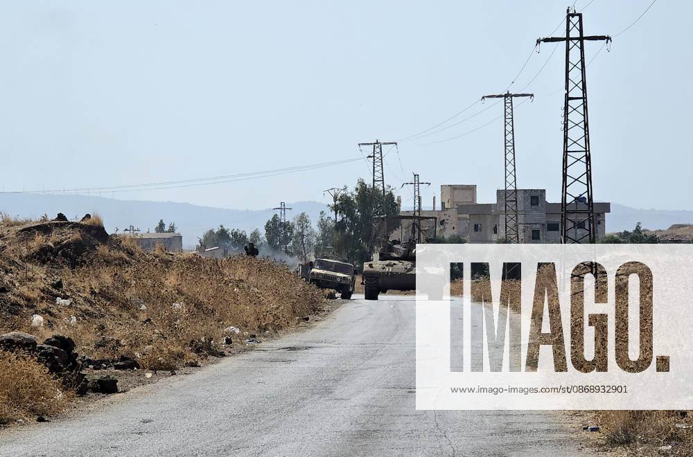 Israeli army conducts raids in Syria s Quneitra countryside QUNEITRA, SYRIA - OCTOBER 8: Israeli forces patrol the village with tanks as they conduct raids in residential areas and fire harassment shots at open areas in the countryside of Quneitra, southern Syria, on October 8, 2026. Huseyin Mesal Anadolu Quneitra Syria. Editorial use only. Please get in touch for any other usage.
