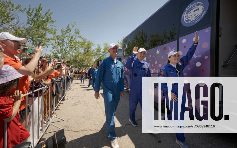 Baikonur, Kazakhstan. 14 July, 2026. NASA astronaut Anil Menon, left, and Roscosmos cosmonauts Pyotr Dubrov and Anna Kikina walk out of the Cosmonaut Hotel to suit up for their Soyuz launch, July 14, 2026 in Baikonur, Kazakhstan. The crew launched later that day to the International Space Station. Baikonur Kazakhstan - ZUMAp138 20261008_zaa_p138_010