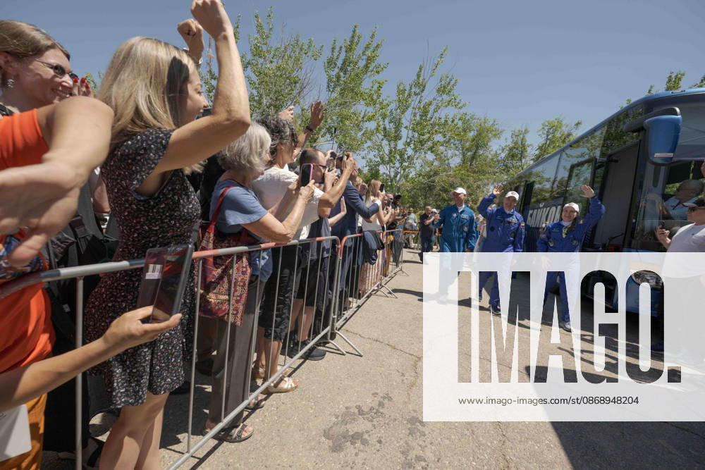 Baikonur, Kazakhstan. 14 July, 2026. NASA astronaut Anil Menon, left, and Roscosmos cosmonauts Pyotr Dubrov and Anna Kikina walk out of the Cosmonaut Hotel to suit up for their Soyuz launch, July 14, 2026 in Baikonur, Kazakhstan. The crew launched later that day to the International Space Station. Baikonur Kazakhstan - ZUMAp138 20261008_zaa_p138_026