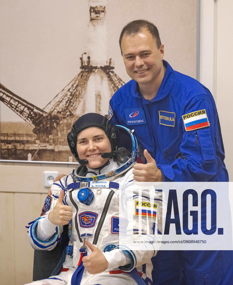 Baikonur, Kazakhstan. 14 July, 2026. Roscosmos cosmonaut Anna Kikina and backup crew member Dmitry Petelin give a thumbs up before her Sokol suit pressure check at the Baikonur Cosmodrome, July 14, 2026 in Baikonur, Kazakhstan. She launched to the International Space Station later that day. Baikonur Kazakhstan - ZUMAp138 20261008_zaa_p138_046