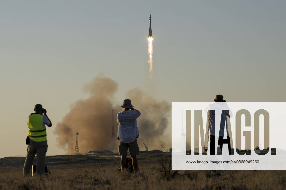 Baikonur, Kazakhstan. 14 July, 2026. Photographers capture a Soyuz rocket lifting off from the Baikonur Cosmodrome carrying the Expedition 75 crew to the International Space Station, July 14, 2026 in Baikonur, Kazakhstan. NASA astronaut Anil Menon and cosmonauts Pyotr Dubrov and Anna Kikina were aboard. Baikonur Kazakhstan - ZUMAp138 20261008_zaa_p138_073