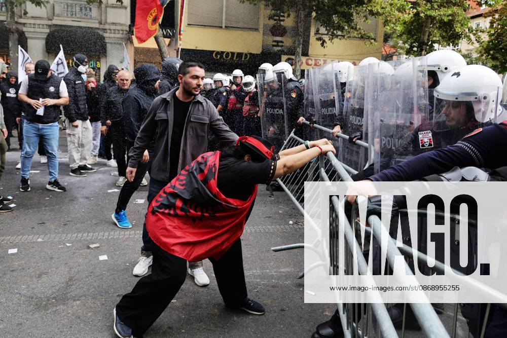 Tensions at Albanian Parliament over territorial reform TIRANA, ALBANIA OCTOBER 8, 2026: Citizens, local activists and supporters of the opposition gather outside the Albanian Parliament as lawmakers debate and vote on proposed changes to the countrys administrative-territorial division. The reform proposes reducing the number of municipalities from 61 to 46 through the merger of 15 existing municipalities, including Divjakë, Polican and Memaliaj. Residents and representatives of municipalities affected by the proposed changes joined the protest, calling for their municipalities to be preserved. Protesters displayed banners and slogans opposing the proposed mergers. Tensions escalated between protesters and police, with reports of